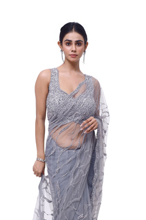 Shop beautiful light grey embroidered net saree online in USA with saree blouse. Look your best at parties and weddings in beautiful designer sarees, embroidered sarees, handwoven sarees, silk sarees, organza saris from Pure Elegance Indian saree store in USA.-closeup