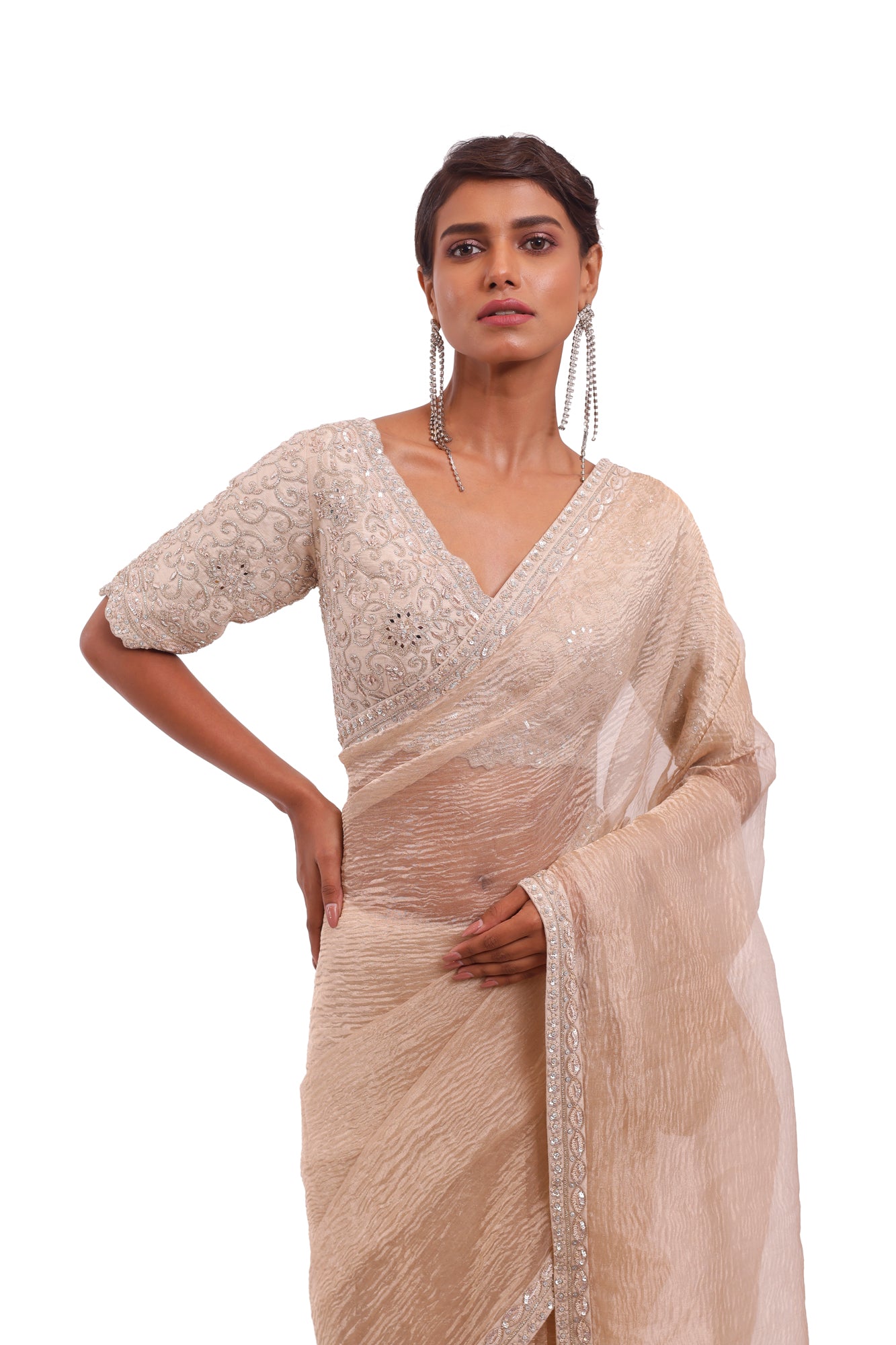 Buy golden crinkled tissue saree online in USA with embroidered saree blouse. Look your best at parties and weddings in beautiful designer sarees, embroidered sarees, handwoven sarees, silk sarees, organza saris from Pure Elegance Indian saree store in USA.-closeup