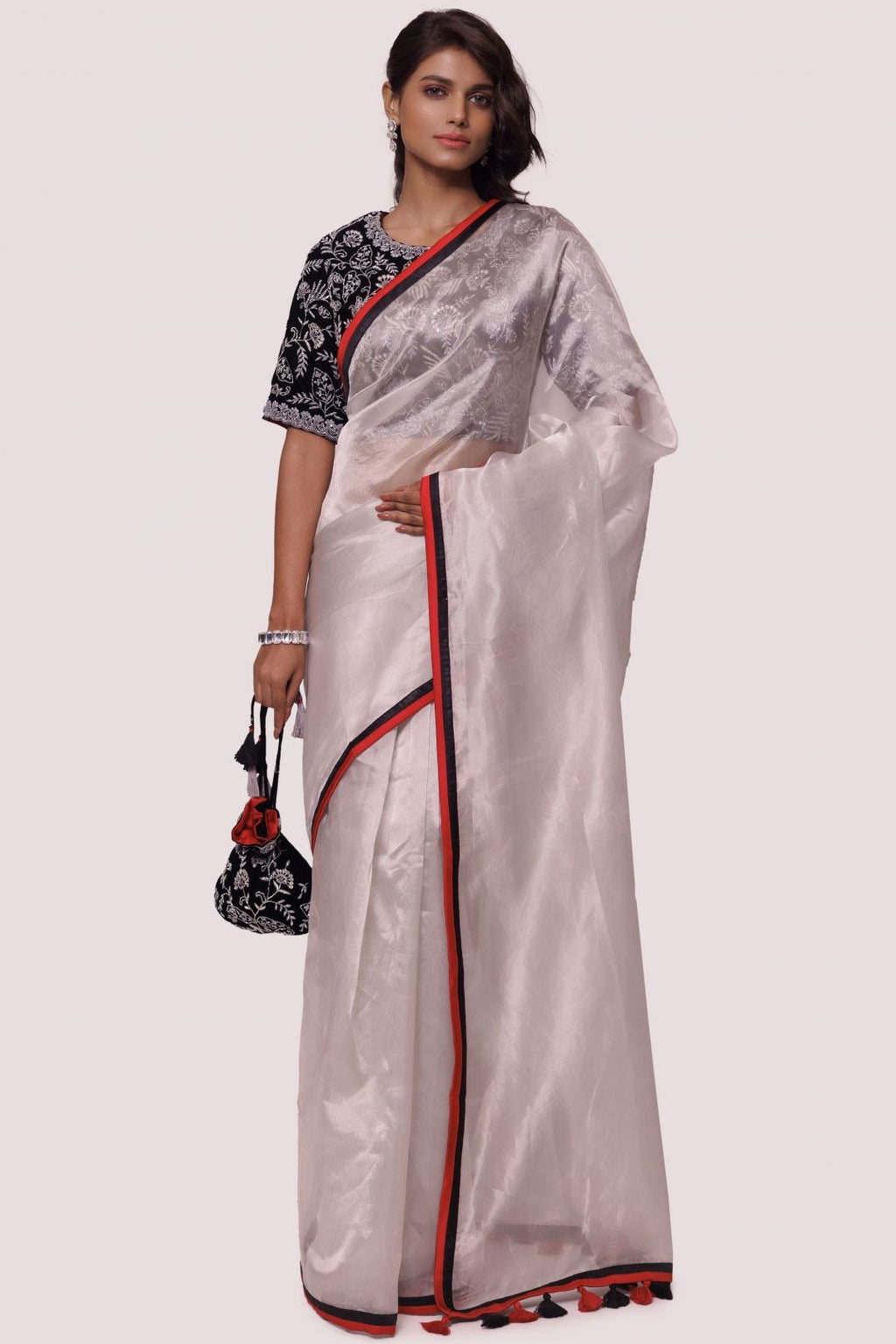 Buy silver tissue saree online in USA with black embroidered saree blouse. Look your best at parties and weddings in beautiful designer sarees, embroidered sarees, handwoven sarees, silk sarees, organza saris from Pure Elegance Indian saree store in USA.-full view