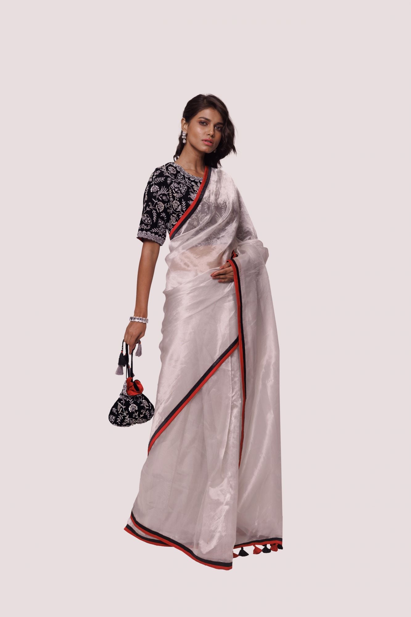 Buy silver tissue saree online in USA with black embroidered saree blouse. Look your best at parties and weddings in beautiful designer sarees, embroidered sarees, handwoven sarees, silk sarees, organza saris from Pure Elegance Indian saree store in USA.-saree