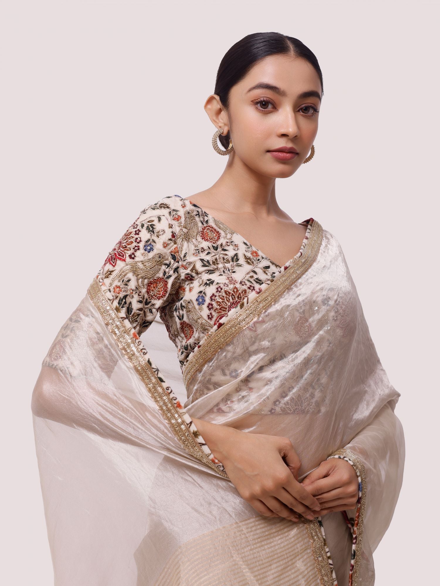 Shop beige handloom tissue saree online in USA with velvet saree blouse. Look your best at parties and weddings in beautiful designer sarees, embroidered sarees, handwoven sarees, silk sarees, organza saris from Pure Elegance Indian saree store in USA.-closeup