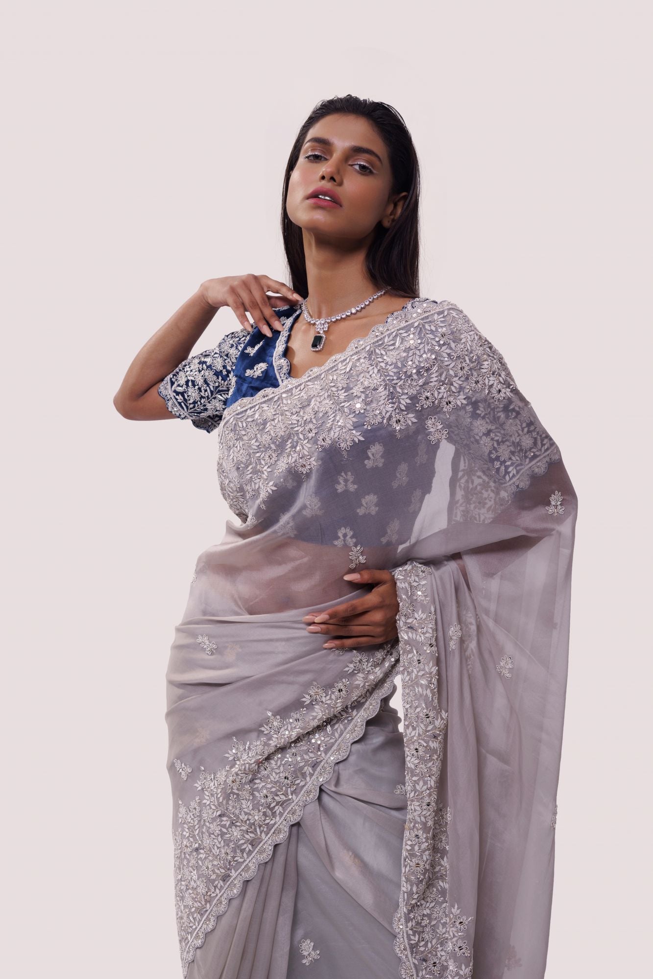 Shop grey embroidered organza saree online in USA with blue saree blouse. Look your best at parties and weddings in beautiful designer sarees, embroidered sarees, handwoven sarees, silk sarees, organza saris from Pure Elegance Indian saree store in USA.-closeup