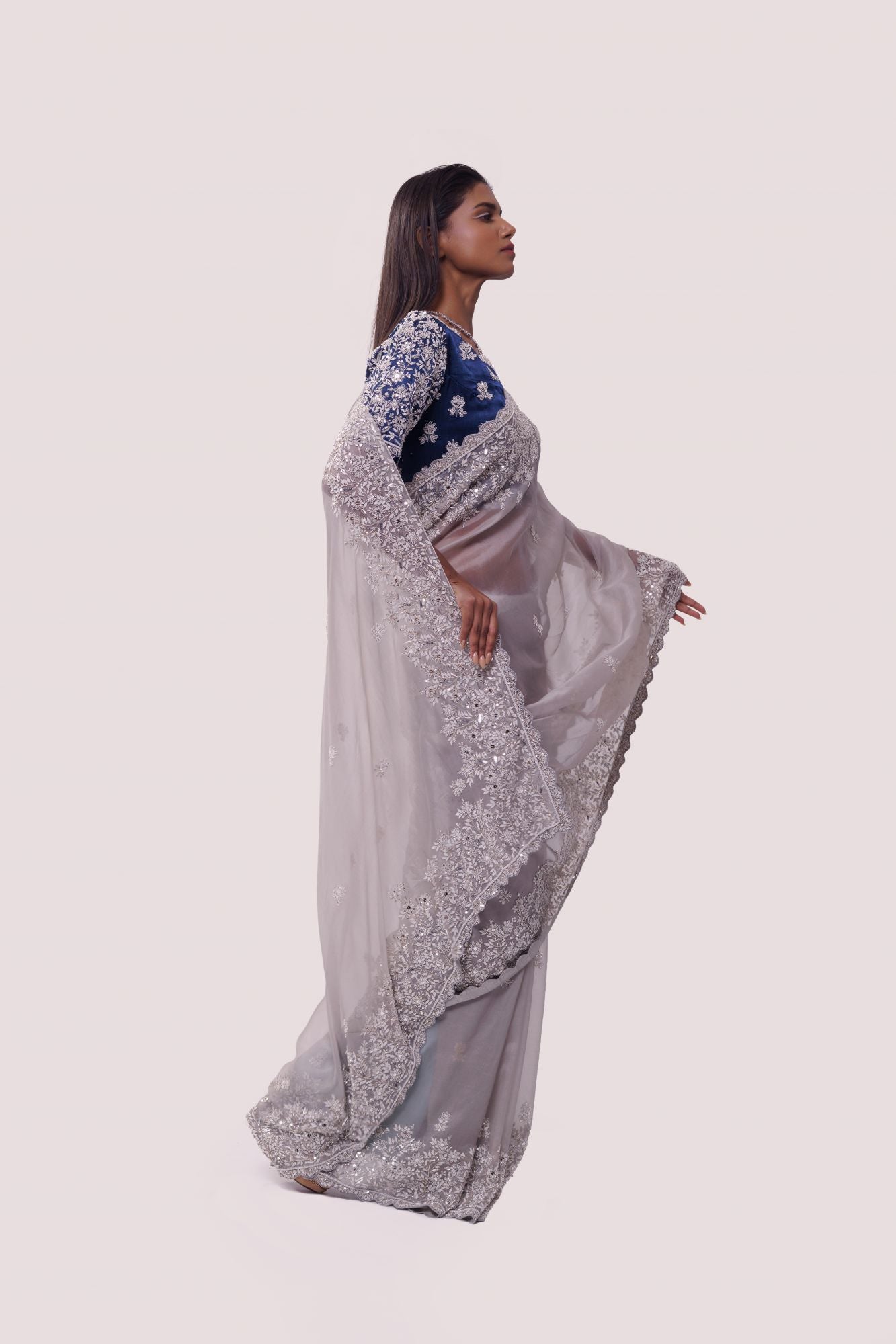 Shop grey embroidered organza saree online in USA with blue saree blouse. Look your best at parties and weddings in beautiful designer sarees, embroidered sarees, handwoven sarees, silk sarees, organza saris from Pure Elegance Indian saree store in USA.-side