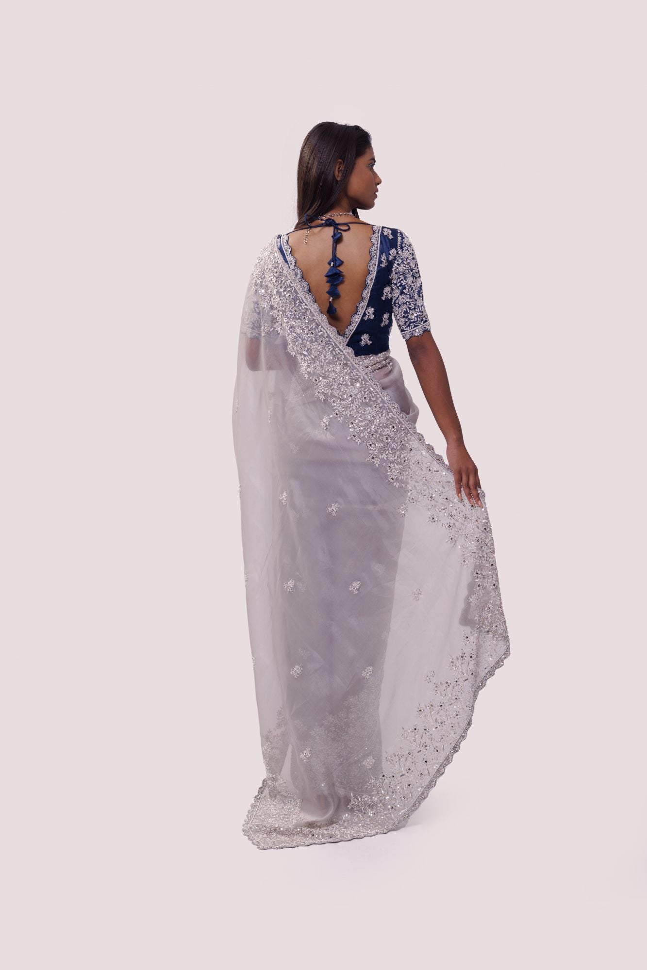 Shop grey embroidered organza saree online in USA with blue saree blouse. Look your best at parties and weddings in beautiful designer sarees, embroidered sarees, handwoven sarees, silk sarees, organza saris from Pure Elegance Indian saree store in USA.-back