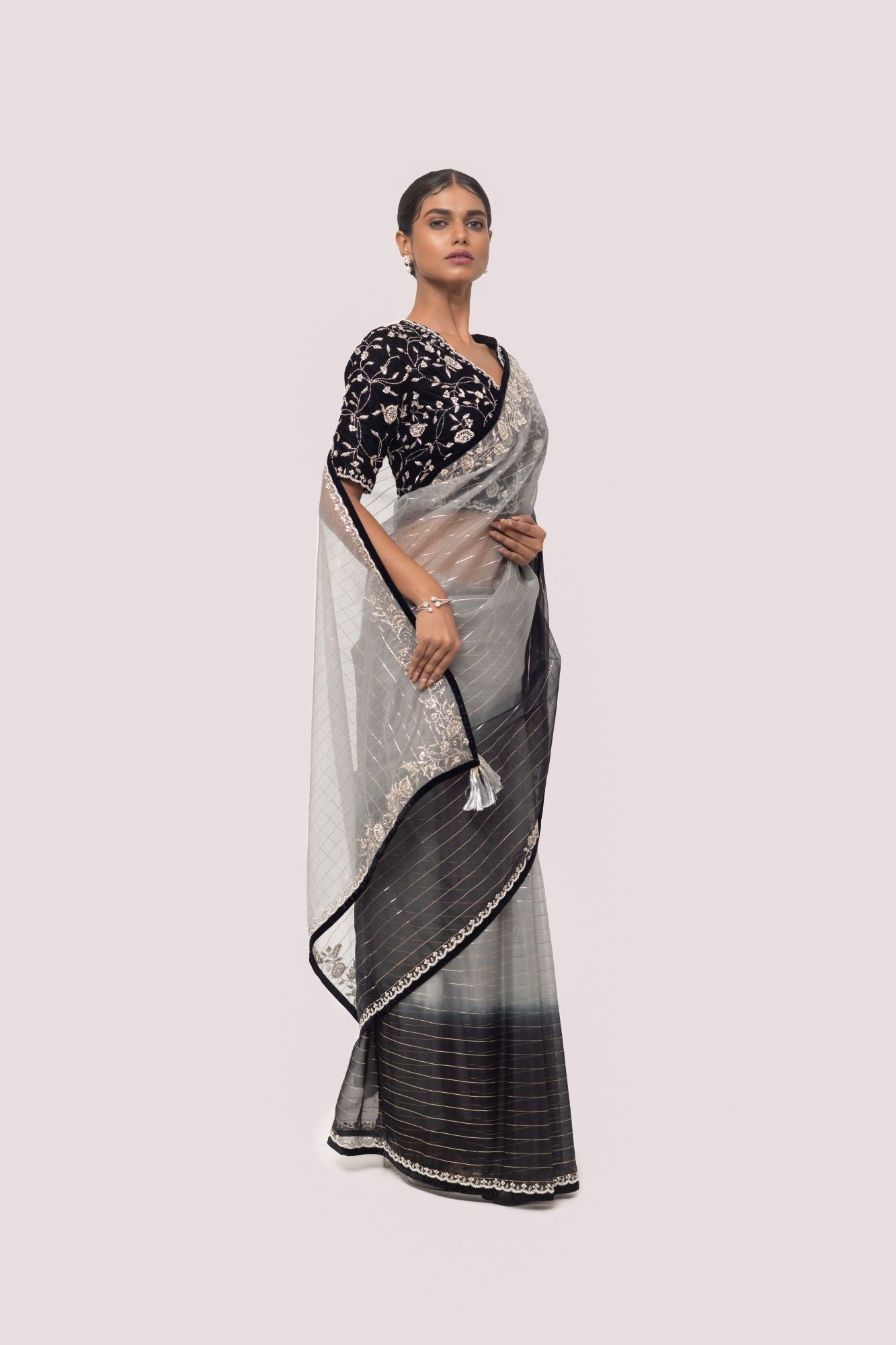 Buy grey and black embroidered organza saree online in USA with velvet saree blouse. Look your best at parties and weddings in beautiful designer sarees, embroidered sarees, handwoven sarees, silk sarees, organza saris from Pure Elegance Indian saree store in USA.-side