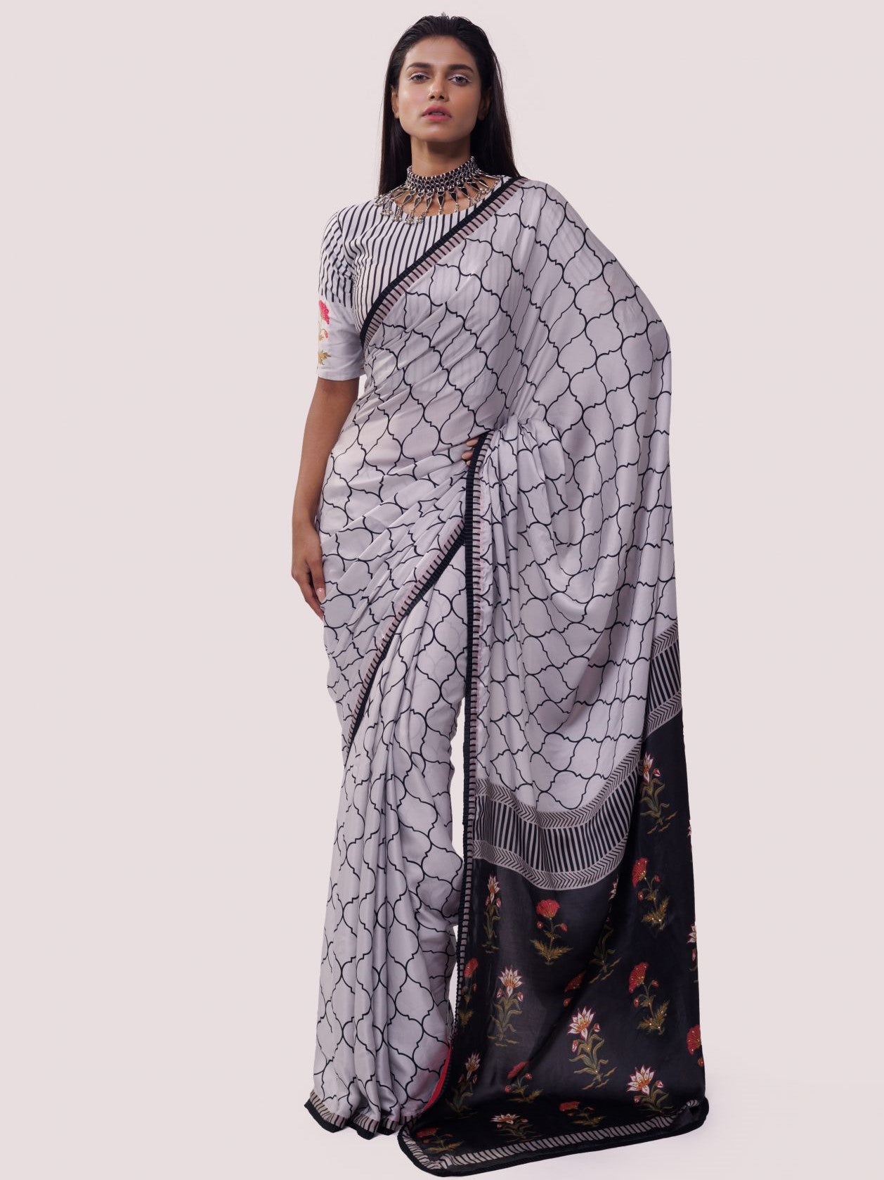 Shop white and black printed handloom saree online in USA with blouse. Make a fashion statement on festive occasions and weddings with designer sarees, designer suits, Indian dresses, Anarkali suits, palazzo suits, designer gowns, sharara suits, embroidered sarees from Pure Elegance Indian fashion store in USA.-full view