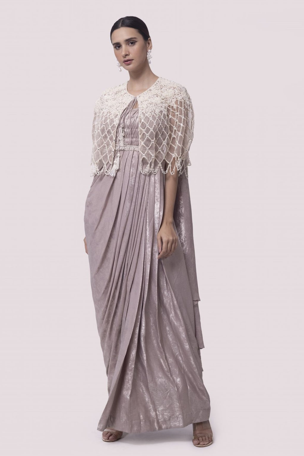 Shop onion pink saree set with pearl embroidery. Make a fashion statement on festive occasions and weddings with designer sarees, designer suits, Indian dresses, Anarkali suits, palazzo suits, designer gowns, sharara suits, and embroidered sarees from Pure Elegance Indian fashion store in the USA.