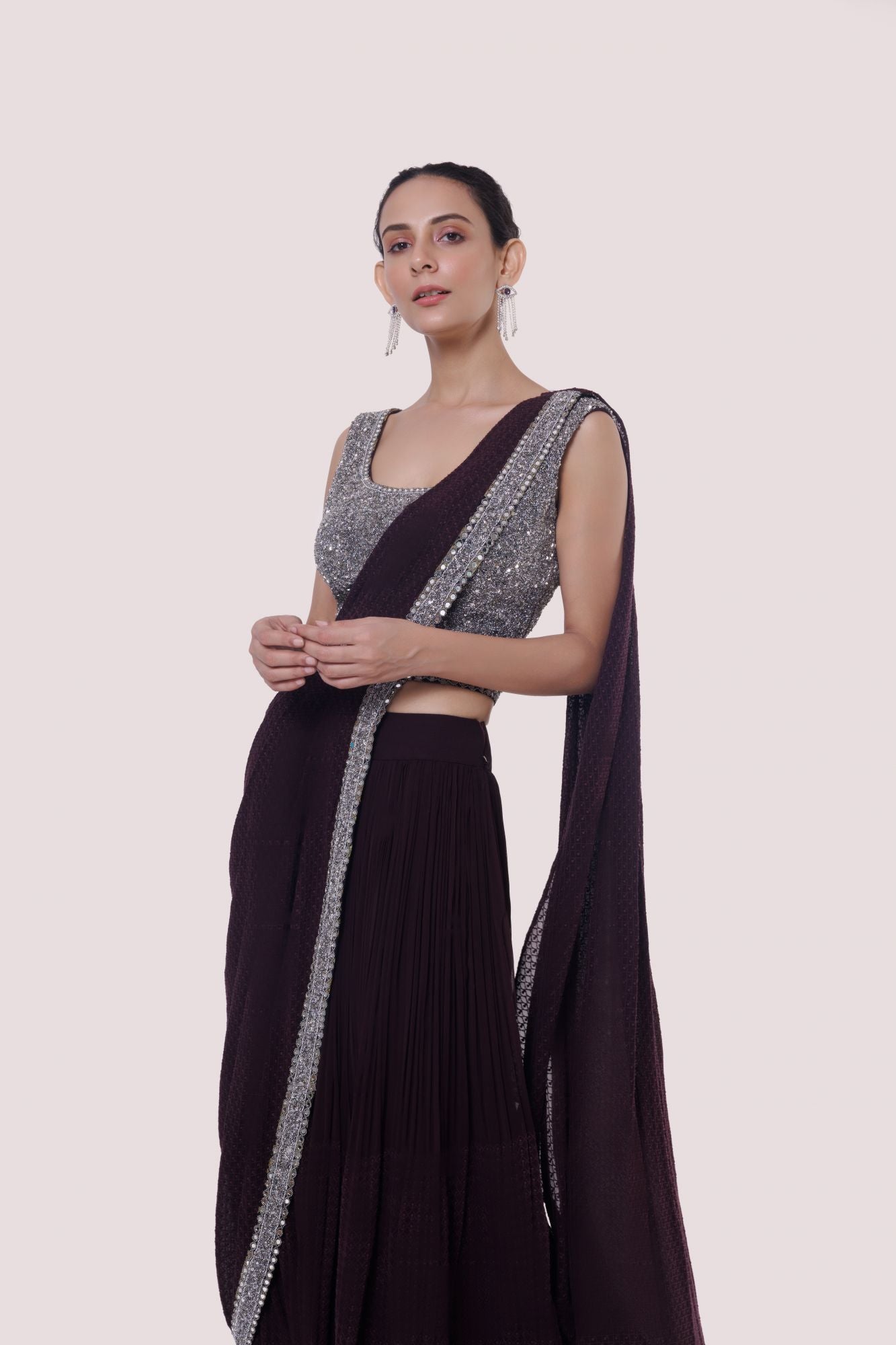 Shop a navy blue drape saree set featuring mirror work. Make a fashion statement on festive occasions and weddings with designer sarees, designer suits, Indian dresses, Anarkali suits, palazzo suits, designer gowns, sharara suits, and embroidered sarees from Pure Elegance Indian fashion store in the USA.