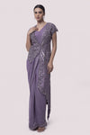 Shop lilac georgette pre-stitched saree with an embroidered jacket. Make a fashion statement on festive occasions and weddings with designer sarees, designer suits, Indian dresses, Anarkali suits, palazzo suits, designer gowns, sharara suits, and embroidered sarees from Pure Elegance Indian fashion store in the USA.