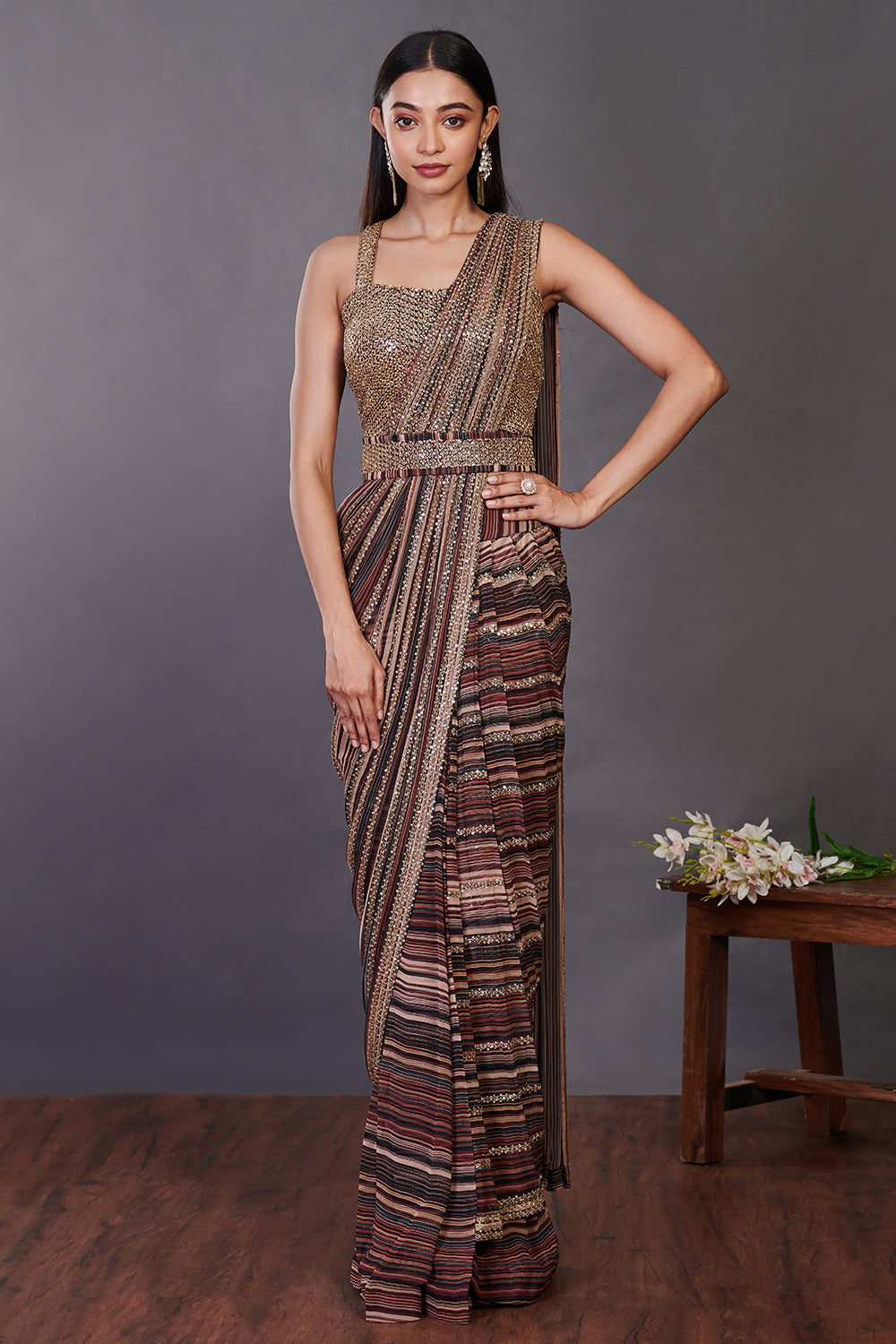 Shop a multicolor pre-stiched saree set with embroidered blouse and belt. Make a fashion statement on festive occasions and weddings with designer sarees, designer suits, Indian dresses, Anarkali suits, palazzo suits, designer gowns, sharara suits, and embroidered sarees from Pure Elegance Indian fashion store in the USA.