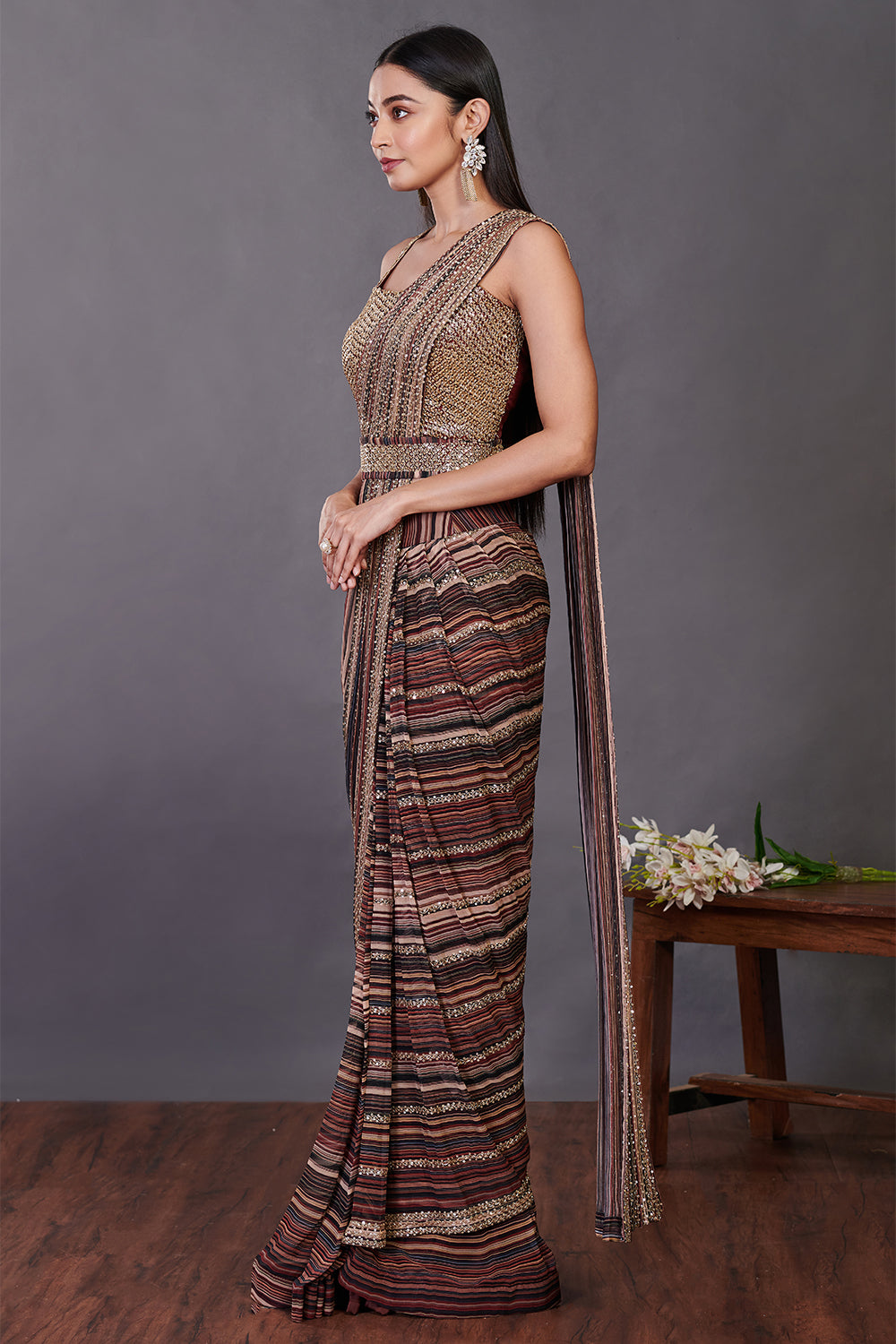 Shop a multicolor pre-stiched saree set with embroidered blouse and belt. Make a fashion statement on festive occasions and weddings with designer sarees, designer suits, Indian dresses, Anarkali suits, palazzo suits, designer gowns, sharara suits, and embroidered sarees from Pure Elegance Indian fashion store in the USA.