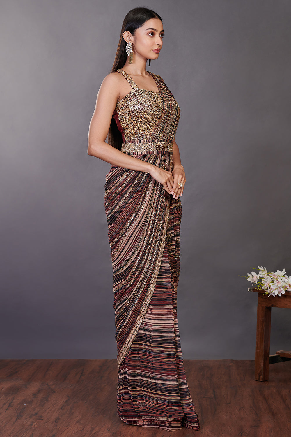 Shop a multicolor pre-stiched saree set with embroidered blouse and belt. Make a fashion statement on festive occasions and weddings with designer sarees, designer suits, Indian dresses, Anarkali suits, palazzo suits, designer gowns, sharara suits, and embroidered sarees from Pure Elegance Indian fashion store in the USA.