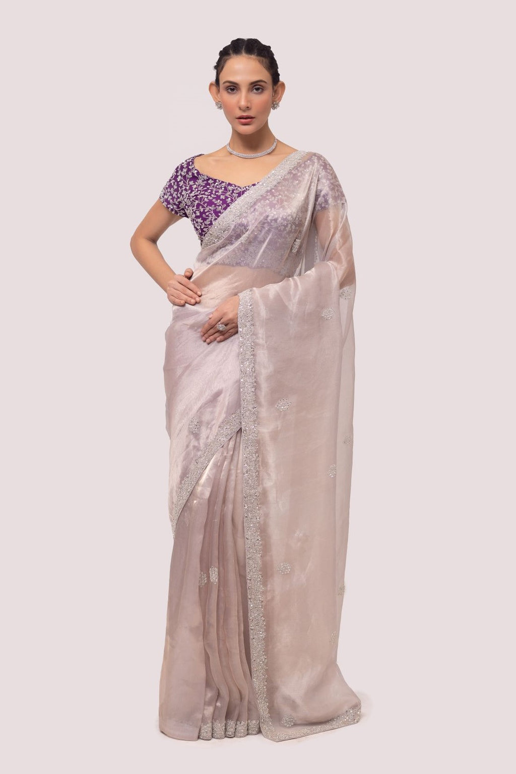 Shop a pre-stitched beige shimmer saree with zari work. Make a fashion statement on festive occasions and weddings with designer sarees, designer suits, Indian dresses, Anarkali suits, palazzo suits, designer gowns, sharara suits, and embroidered sarees from Pure Elegance Indian fashion store in the USA.