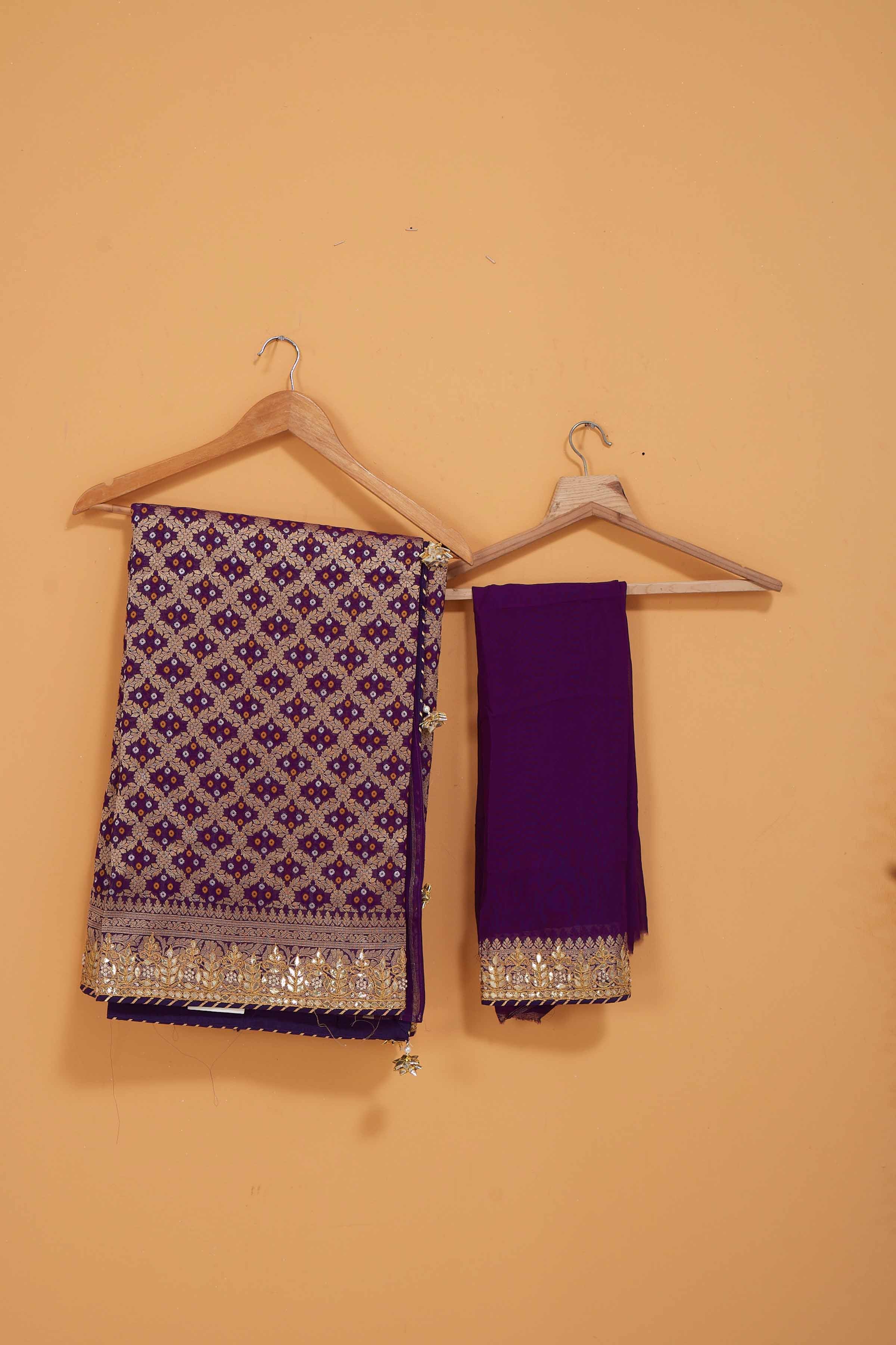 Buy purple bandhej Banarasi saree online in USA with embroidered border. Look royal at weddings and festive occasions in exquisite designer sarees, handwoven sarees, pure silk saris, Banarasi sarees, Kanchipuram silk sarees from Pure Elegance Indian saree store in USA. -blouse