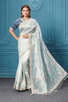 Buy blue tissue Kora silk sari online in USA with bandhej embroidere blouse. Look royal at weddings and festive occasions in exquisite designer sarees, handwoven sarees, pure silk saris, Banarasi sarees, Kanchipuram silk sarees from Pure Elegance Indian saree store in USA. -full view