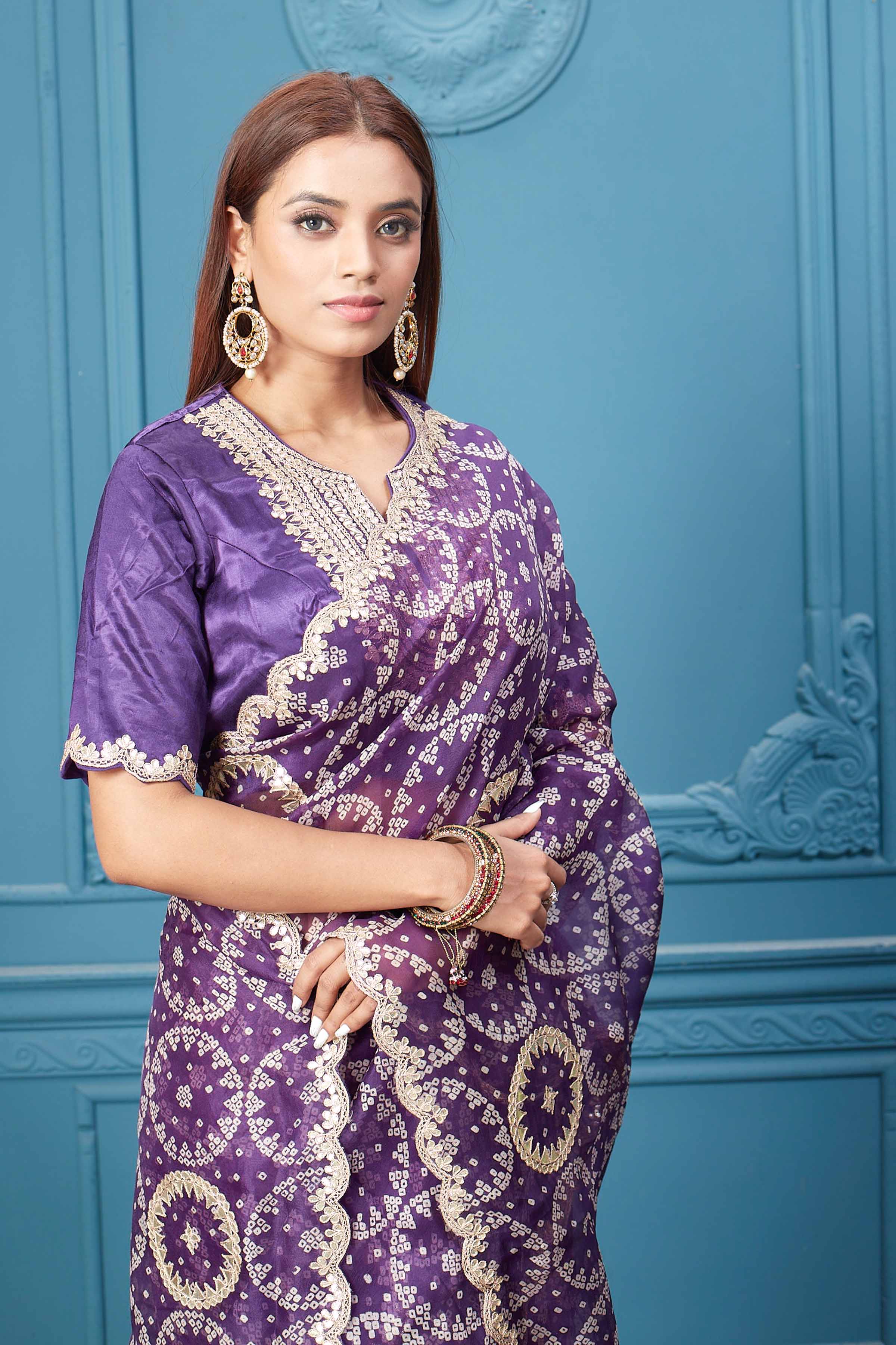 Buy beautiful purple bandhej gota work organza silk sari online in USA with designer blouse. Look royal at weddings and festive occasions in exquisite designer sarees, handwoven sarees, pure silk saris, Banarasi sarees, Kanchipuram silk sarees from Pure Elegance Indian saree store in USA. -closeup