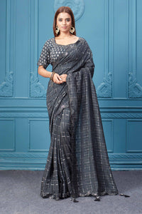 Shop beautiful black mirror border crepe saree online in USA with designer blouse. Look royal at weddings and festive occasions in exquisite designer sarees, handwoven sarees, pure silk saris, Banarasi sarees, Kanchipuram silk sarees from Pure Elegance Indian saree store in USA. -full view