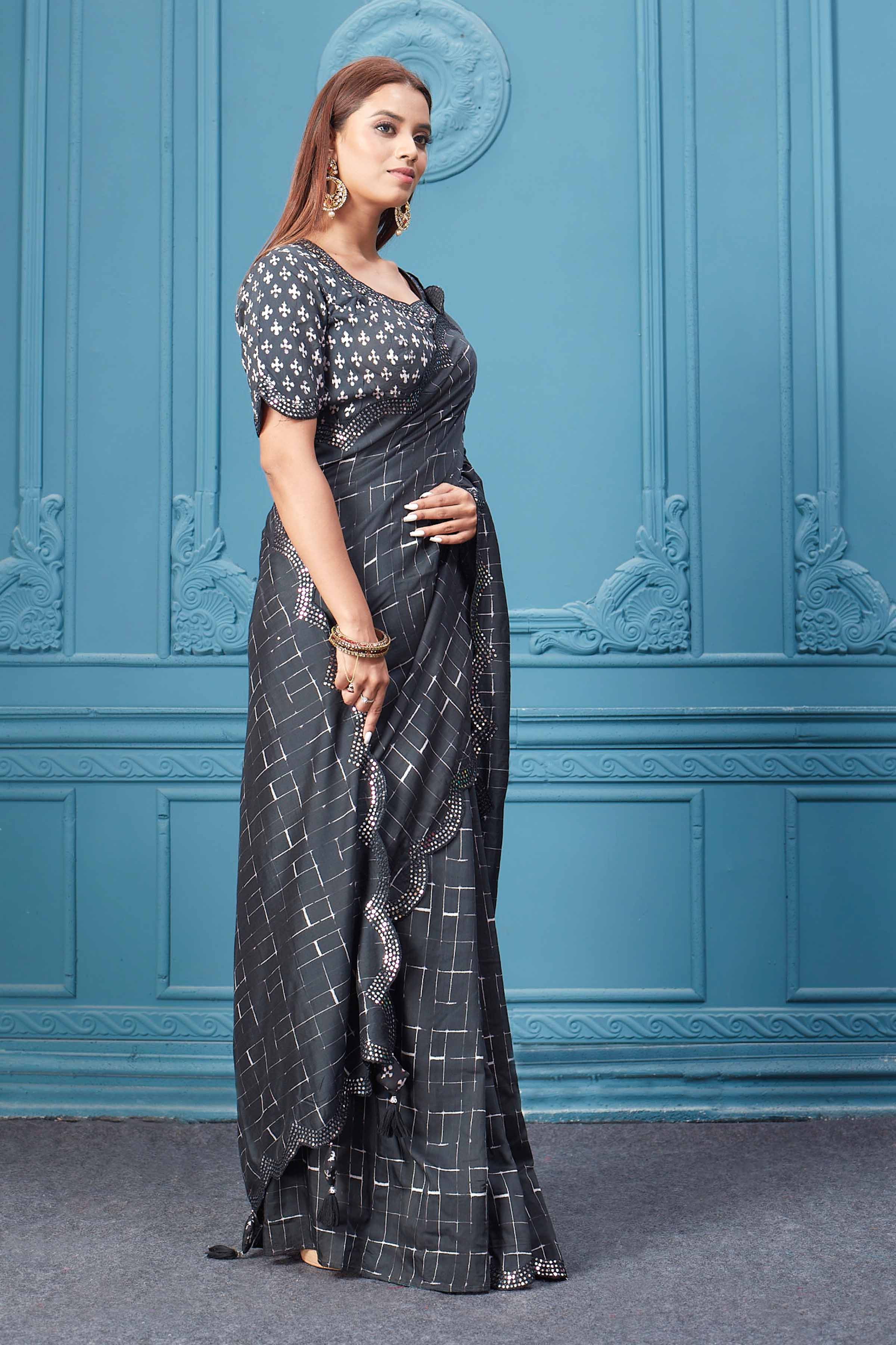 Shop beautiful black mirror border crepe saree online in USA with designer blouse. Look royal at weddings and festive occasions in exquisite designer sarees, handwoven sarees, pure silk saris, Banarasi sarees, Kanchipuram silk sarees from Pure Elegance Indian saree store in USA. -side
