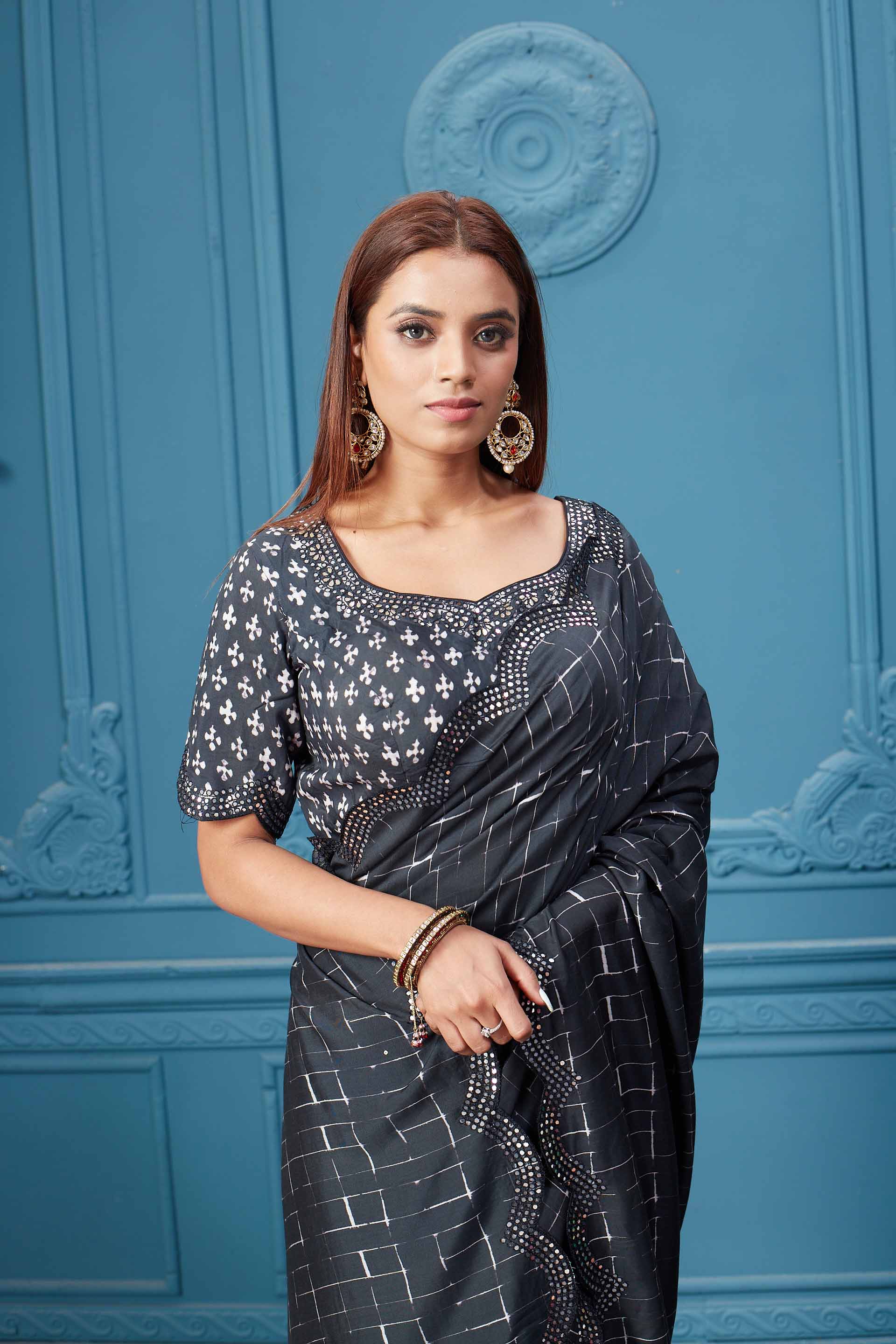 Shop beautiful black mirror border crepe saree online in USA with designer blouse. Look royal at weddings and festive occasions in exquisite designer sarees, handwoven sarees, pure silk saris, Banarasi sarees, Kanchipuram silk sarees from Pure Elegance Indian saree store in USA. -closeup