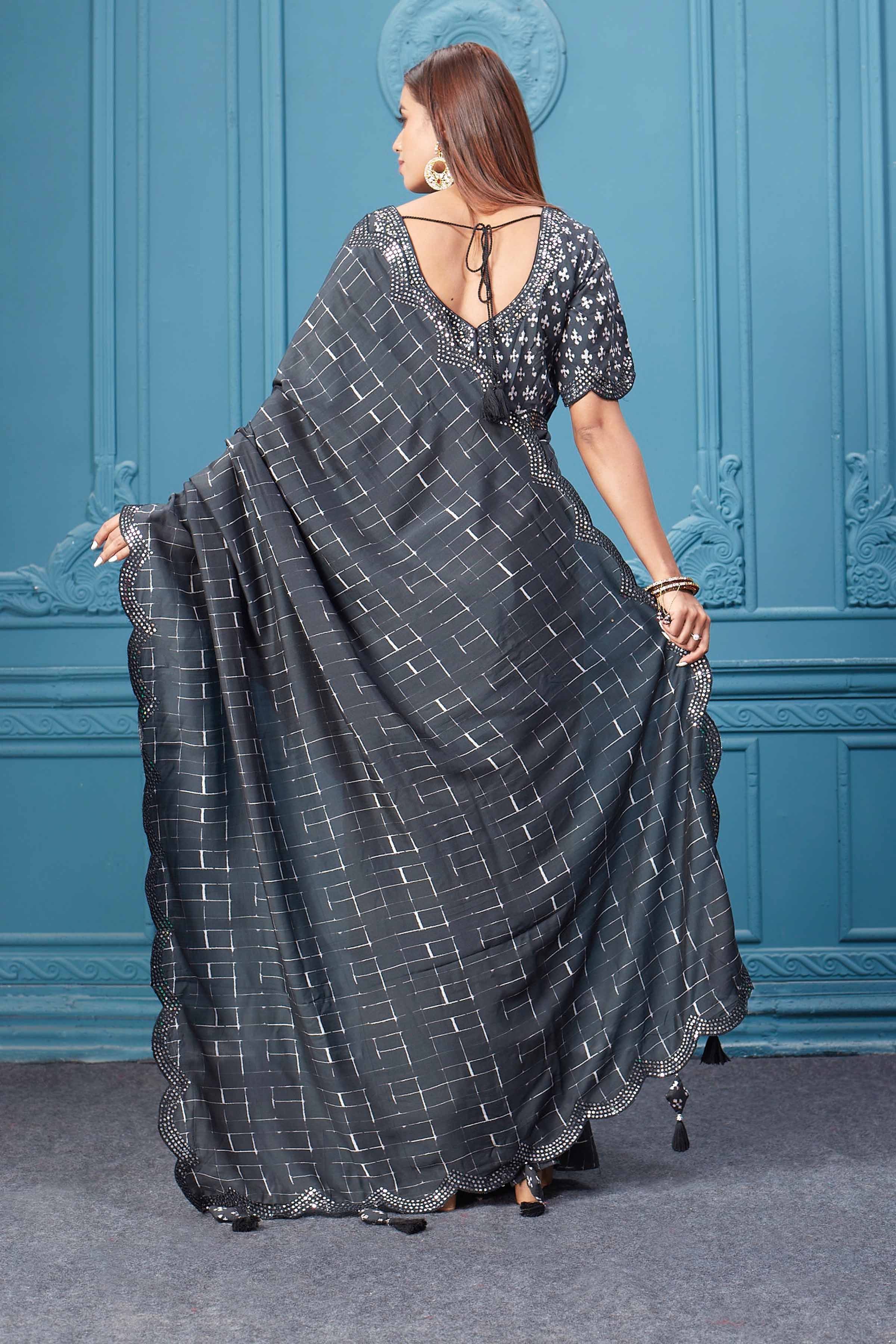 Shop beautiful black mirror border crepe saree online in USA with designer blouse. Look royal at weddings and festive occasions in exquisite designer sarees, handwoven sarees, pure silk saris, Banarasi sarees, Kanchipuram silk sarees from Pure Elegance Indian saree store in USA. -back