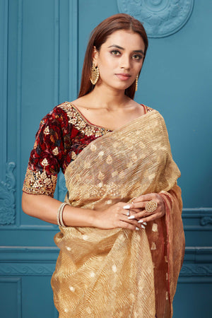 Buy golden tissue saree online in USA with velvet embroidered blouse. Look royal at weddings and festive occasions in exquisite designer sarees, handwoven sarees, pure silk saris, Banarasi sarees, Kanchipuram silk sarees from Pure Elegance Indian saree store in USA. -closeup