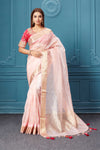 Buy light pink organza silk saree online in USA with pink Patola embroidered blouse. Look royal at weddings and festive occasions in exquisite designer sarees, handwoven sarees, pure silk saris, Banarasi sarees, Kanchipuram silk sarees from Pure Elegance Indian saree store in USA. -full view