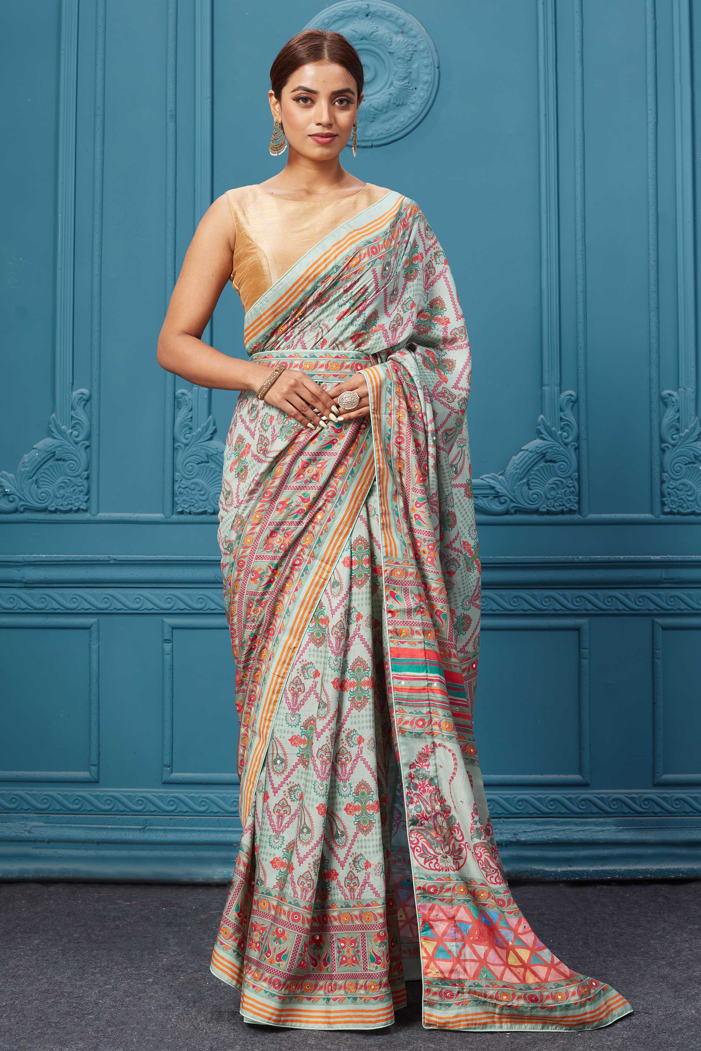 Buy a pastel multicolor chevron blue Mulberry silk embroidered saree online in USA. Look royal at weddings and festive occasions in exquisite designer sarees, handwoven sarees, pure silk saris, Banarasi sarees, Kanchipuram silk sarees from Pure Elegance Indian saree store in USA. 