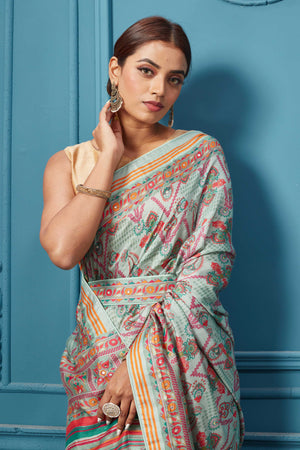 Buy a pastel multicolor chevron blue Mulberry silk embroidered saree online in USA. Look royal at weddings and festive occasions in exquisite designer sarees, handwoven sarees, pure silk saris, Banarasi sarees, Kanchipuram silk sarees from Pure Elegance Indian saree store in USA. 
