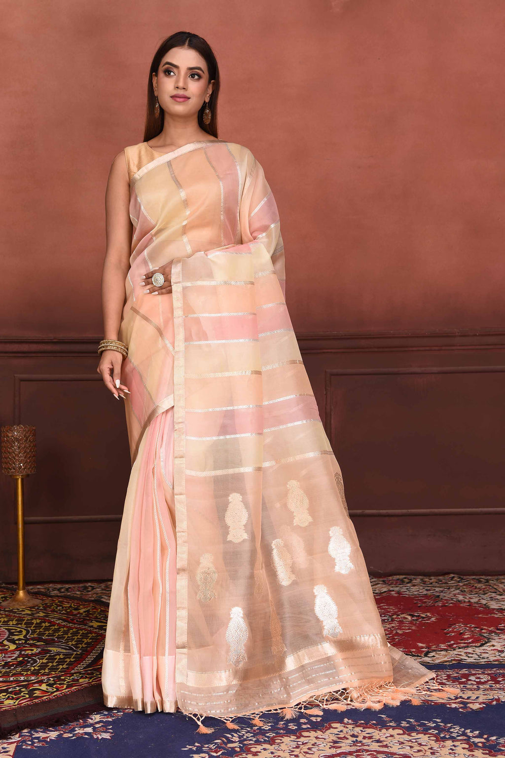 Buy pastel pink zari stripes organza Banarasi saree online in USA with zari buta. Look your best on festive occasions in latest designer sarees, pure silk sarees, Kanchipuram silk sarees, handwoven sarees, tussar silk sarees, embroidered sarees from Pure Elegance Indian clothing store in USA.-full view
