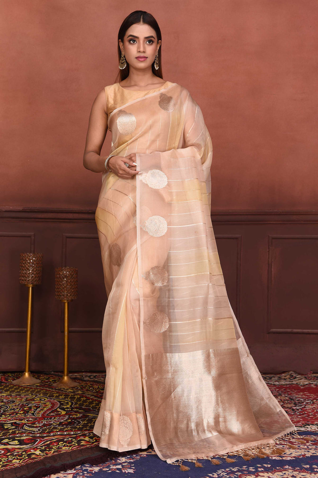 Buy cream zari stripes organza Banarasi sari online in USA with zari buta. Look your best on festive occasions in latest designer sarees, pure silk sarees, Kanchipuram silk sarees, handwoven sarees, tussar silk sarees, embroidered sarees from Pure Elegance Indian clothing store in USA.-full view