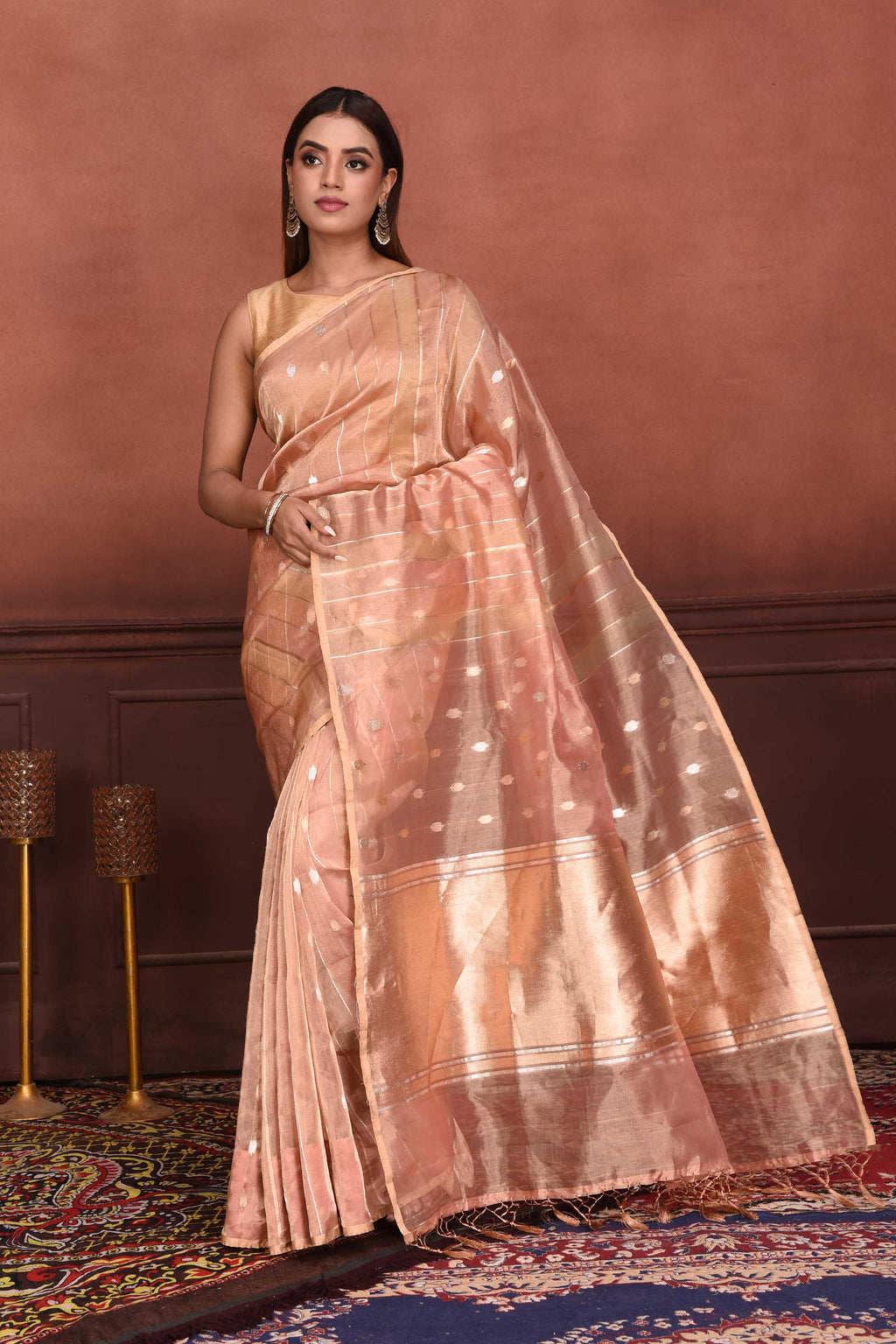 Shop peach zari stripes organza Banarasi saree online in USA with buta. Look your best on festive occasions in latest designer sarees, pure silk sarees, Kanchipuram silk sarees, handwoven sarees, tussar silk sarees, embroidered sarees from Pure Elegance Indian clothing store in USA.-full view