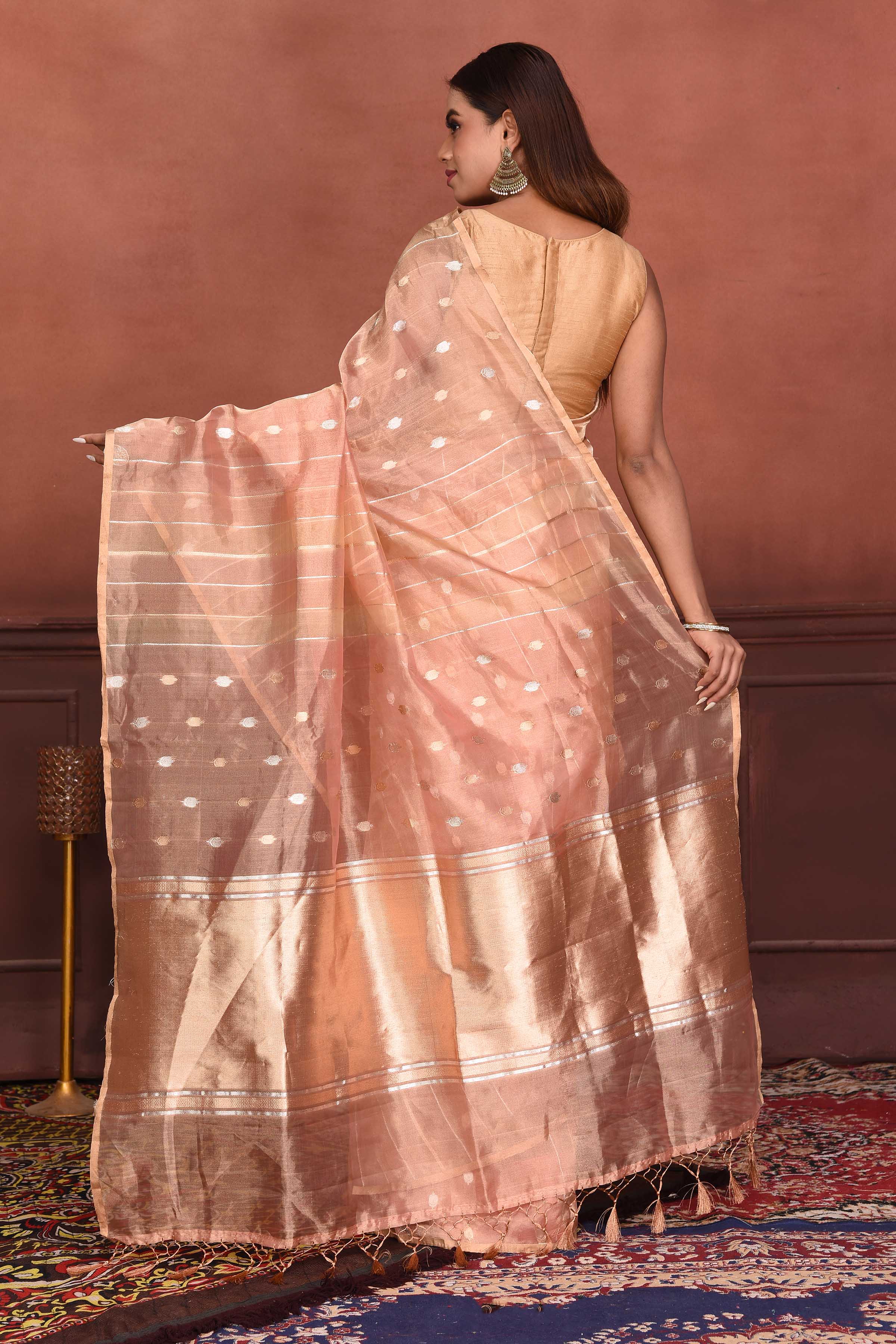 Shop peach zari stripes organza Banarasi saree online in USA with buta. Look your best on festive occasions in latest designer sarees, pure silk sarees, Kanchipuram silk sarees, handwoven sarees, tussar silk sarees, embroidered sarees from Pure Elegance Indian clothing store in USA.-back