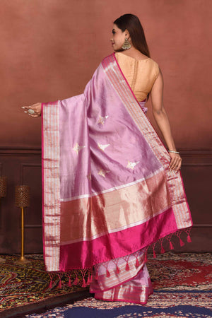 Buy beautiful lavender Katan silk Banarasi saree online in USA with floral buta. Look your best on festive occasions in latest designer sarees, pure silk sarees, Kanchipuram silk sarees, handwoven sarees, tussar silk sarees, embroidered sarees from Pure Elegance Indian clothing store in USA.-back