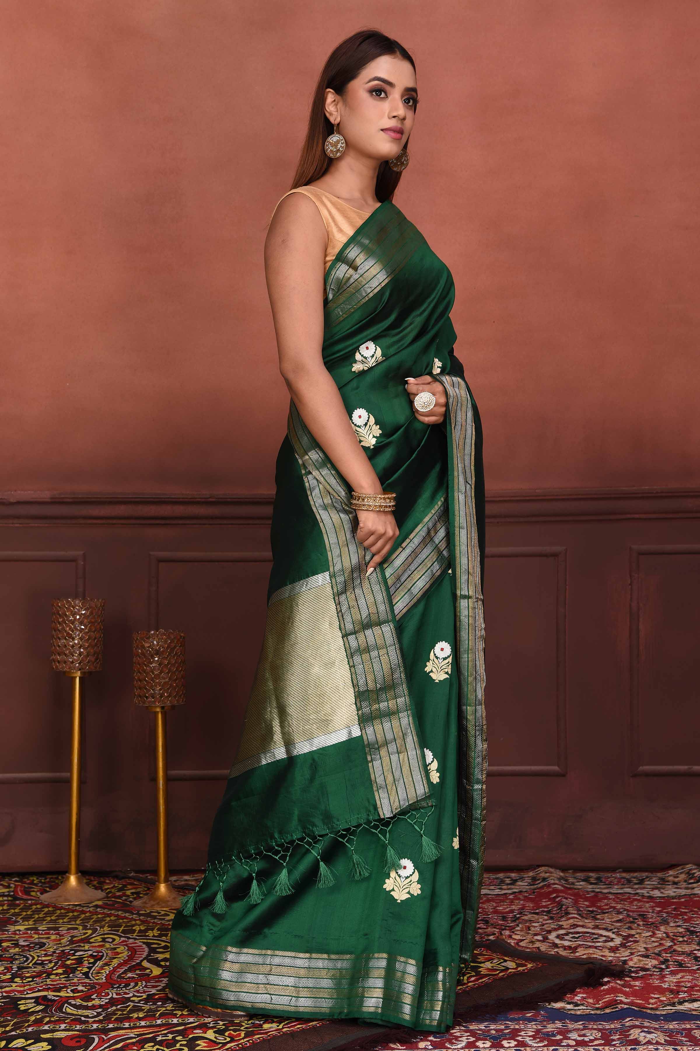 Buy bottle green Katan silk Banarasi saree online in USA with floral buta. Look your best on festive occasions in latest designer sarees, pure silk sarees, Kanchipuram silk sarees, handwoven sarees, tussar silk sarees, embroidered sarees from Pure Elegance Indian clothing store in USA.-side