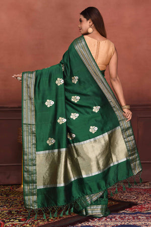 Buy bottle green Katan silk Banarasi saree online in USA with floral buta. Look your best on festive occasions in latest designer sarees, pure silk sarees, Kanchipuram silk sarees, handwoven sarees, tussar silk sarees, embroidered sarees from Pure Elegance Indian clothing store in USA.-back