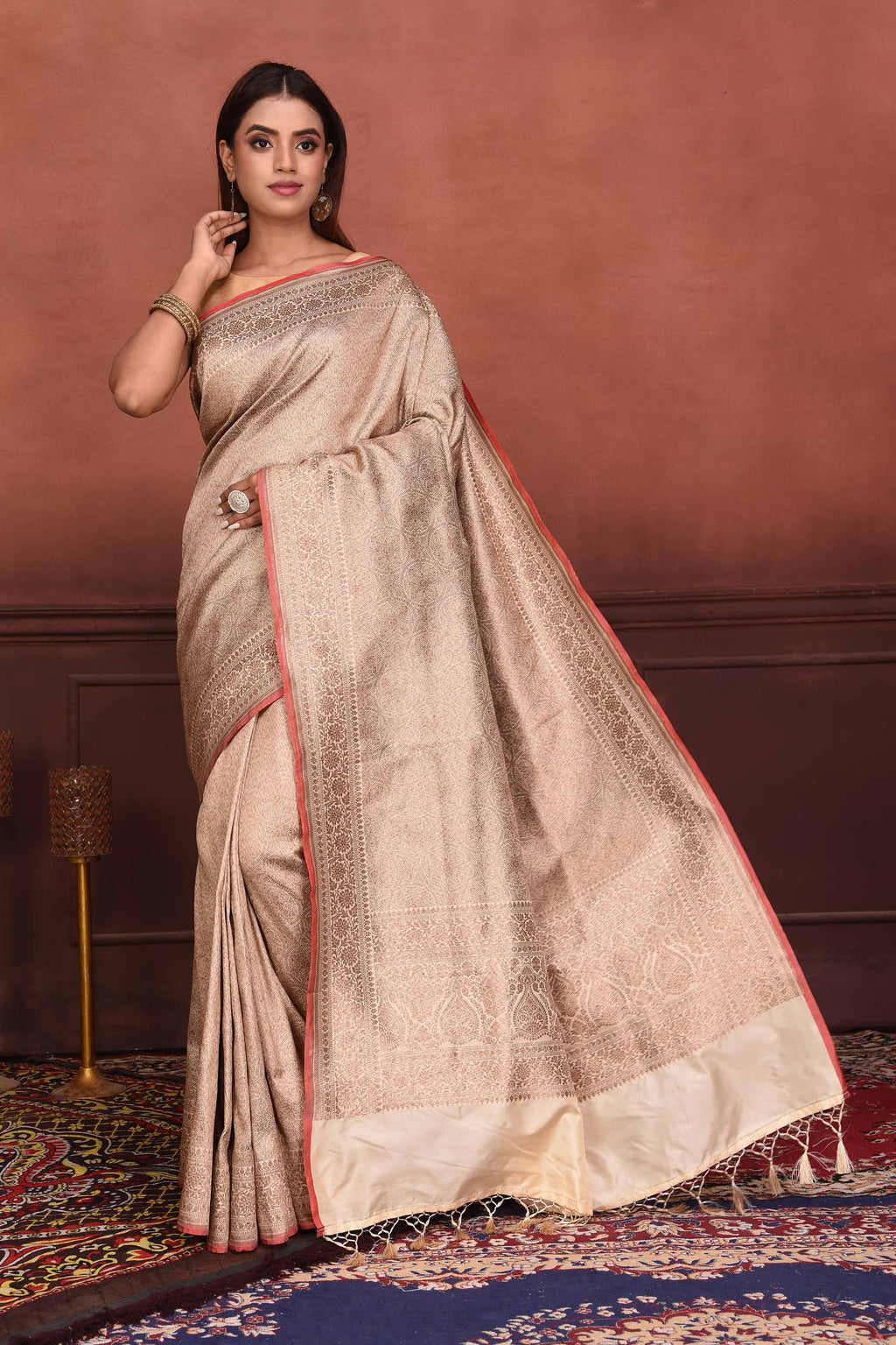 Shop beautiful cream golden Katan silk Banarasi saree online in USA. Look your best on festive occasions in latest designer sarees, pure silk sarees, Kanchipuram silk sarees, handwoven sarees, tussar silk sarees, embroidered sarees from Pure Elegance Indian clothing store in USA.-full view