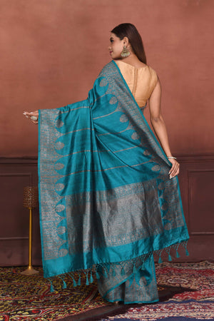 Buy beautiful teal tussar Banarasi saree online in USA with antique zari border. Look your best on festive occasions in latest designer sarees, pure silk sarees, Kanchipuram silk sarees, handwoven sarees, tussar silk sarees, embroidered sarees from Pure Elegance Indian clothing store in USA.-back