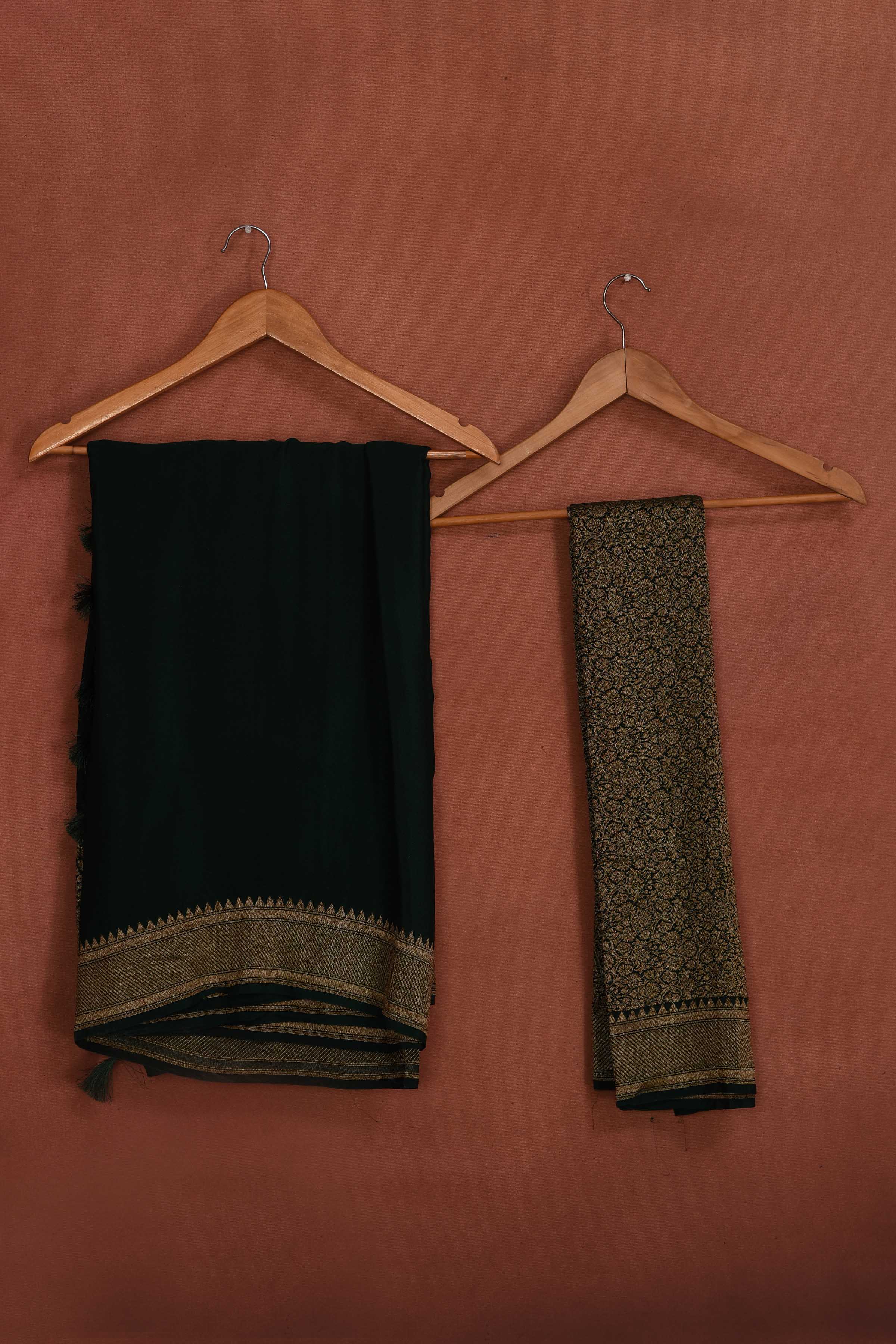 Shop bottle green crepe Banarasi saree online in USA with zari border. Look your best on festive occasions in latest designer sarees, pure silk sarees, Kanchipuram silk sarees, handwoven sarees, tussar silk sarees, embroidered sarees from Pure Elegance Indian clothing store in USA.-blouse