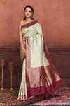 Buy beautiful mint green Katan silk Banarasi saree online in USA with magenta zari border. Look your best on festive occasions in latest designer sarees, pure silk sarees, Kanchipuram silk sarees, handwoven sarees, tussar silk sarees, embroidered sarees from Pure Elegance Indian clothing store in USA.-full view