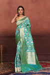 Shop beautiful sea green Katan silk Banarasi sari online in USA with zari minakari work. Look your best on festive occasions in latest designer sarees, pure silk sarees, Kanchipuram silk sarees, handwoven sarees, tussar silk sarees, embroidered sarees from Pure Elegance Indian clothing store in USA.-full view