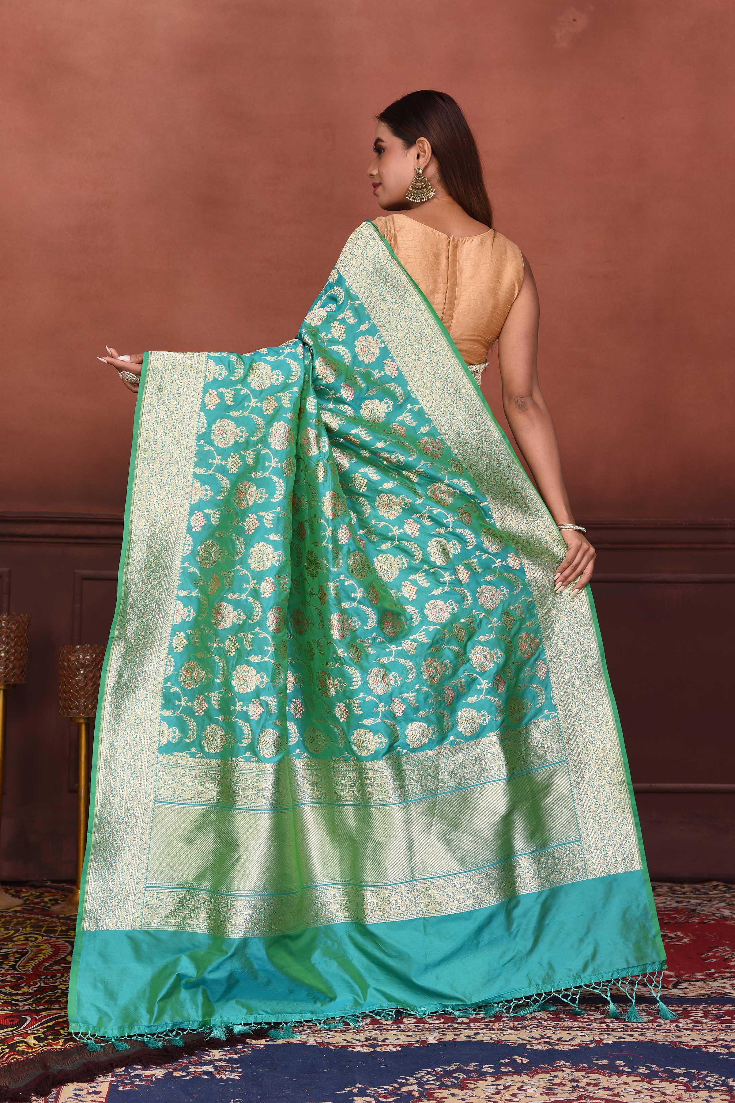 Shop beautiful sea green Katan silk Banarasi sari online in USA with zari minakari work. Look your best on festive occasions in latest designer sarees, pure silk sarees, Kanchipuram silk sarees, handwoven sarees, tussar silk sarees, embroidered sarees from Pure Elegance Indian clothing store in USA.-back