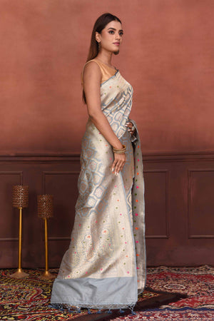 Buy light grey Katan silk Banarasi sari online in USA with zari minakari work. Look your best on festive occasions in latest designer sarees, pure silk sarees, Kanchipuram silk sarees, handwoven sarees, tussar silk sarees, embroidered sarees from Pure Elegance Indian clothing store in USA.-side