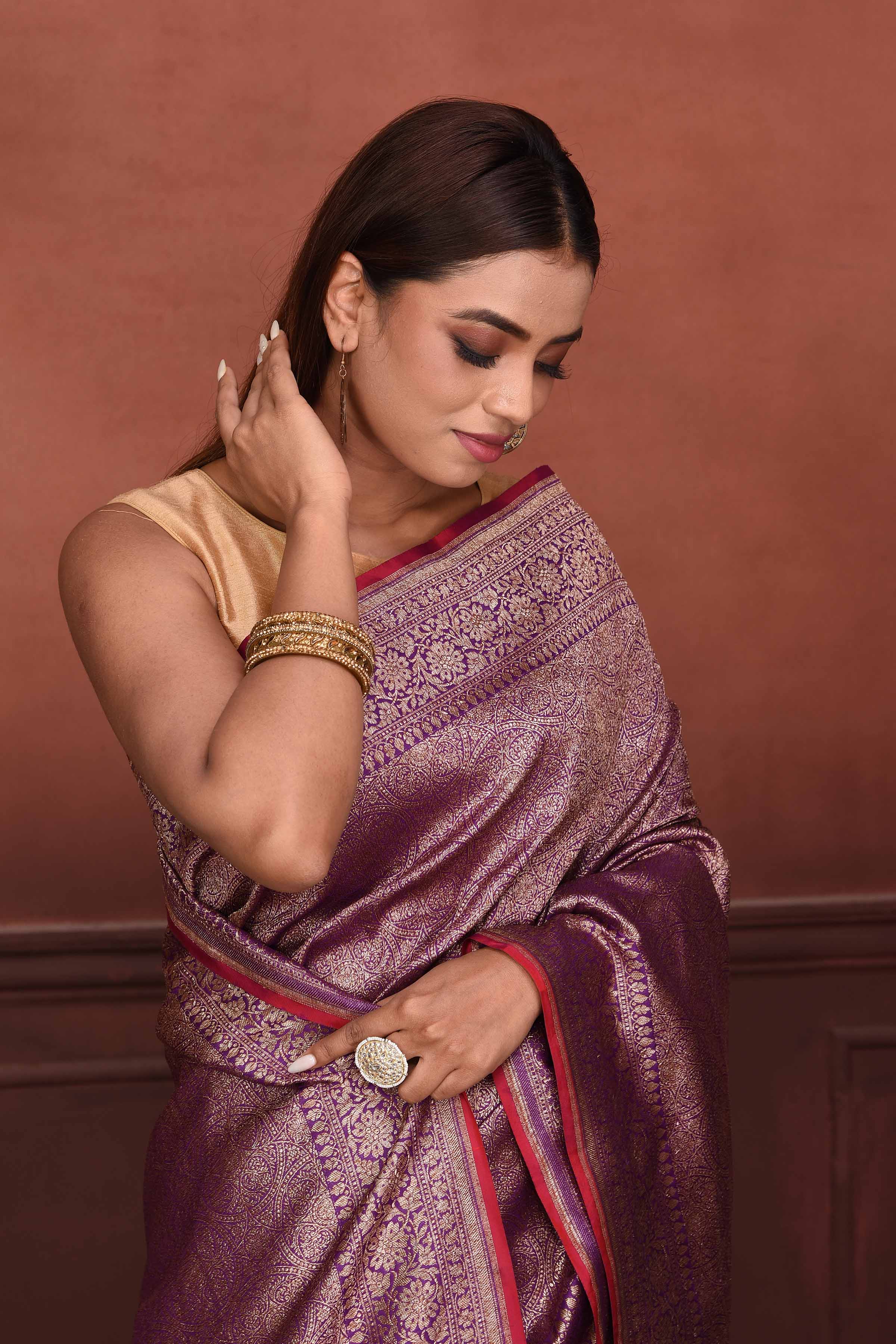 Shop purple Katan silk Banarasi saree online in USA with zari work. Look your best on festive occasions in latest designer sarees, pure silk sarees, Kanchipuram silk sarees, handwoven sarees, tussar silk sarees, embroidered sarees from Pure Elegance Indian clothing store in USA.-closeup