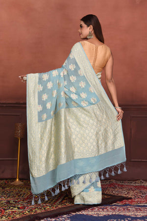 Shop light blue Katan silk Banarasi sari online in USA with zari minakari buta. Look your best on festive occasions in latest designer sarees, pure silk sarees, Kanchipuram silk sarees, handwoven sarees, tussar silk sarees, embroidered sarees from Pure Elegance Indian clothing store in USA.-back