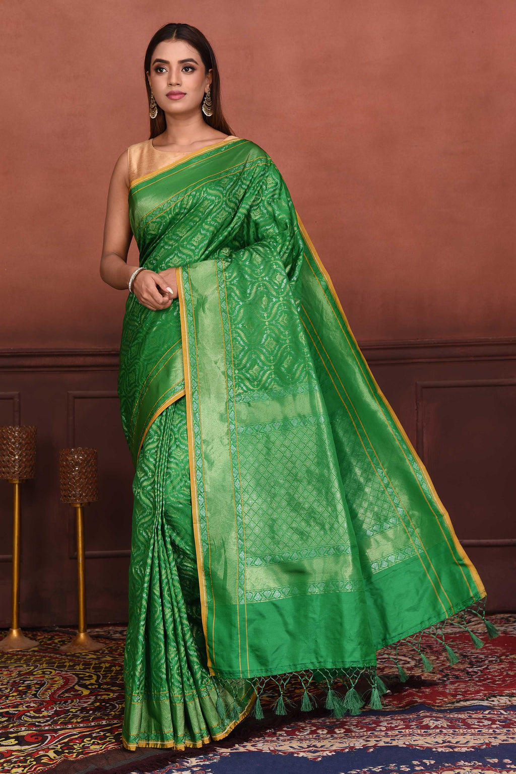 Buy green Katan silk Banarasi saree online in USA with zari work. Look your best on festive occasions in latest designer sarees, pure silk sarees, Kanchipuram silk sarees, handwoven sarees, tussar silk sarees, embroidered sarees from Pure Elegance Indian clothing store in USA.-full view