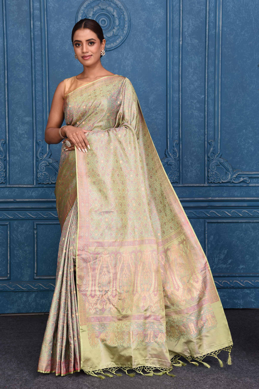 Buy pista green Tanchoi silk Banarasi saree online in USA with zari border and buta. Look your best on festive occasions in latest designer sarees, pure silk saris, Kanchipuram silk sarees, handwoven sarees, tussar silk sarees, embroidered saris from Pure Elegance Indian clothing store in USA.-full view