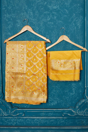 Shop mango yellow Banarasi saree online in USA with zari jaal. Look your best on festive occasions in latest designer sarees, pure silk saris, Kanchipuram silk sarees, handwoven sarees, tussar silk sarees, embroidered sarees from Pure Elegance Indian saree store in USA.-blouse