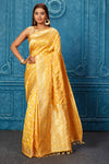 Shop mango yellow Banarasi saree online in USA with zari jaal. Look your best on festive occasions in latest designer sarees, pure silk saris, Kanchipuram silk sarees, handwoven sarees, tussar silk sarees, embroidered sarees from Pure Elegance Indian saree store in USA.-full view