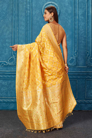 Shop mango yellow Banarasi saree online in USA with zari jaal. Look your best on festive occasions in latest designer sarees, pure silk saris, Kanchipuram silk sarees, handwoven sarees, tussar silk sarees, embroidered sarees from Pure Elegance Indian saree store in USA.-back