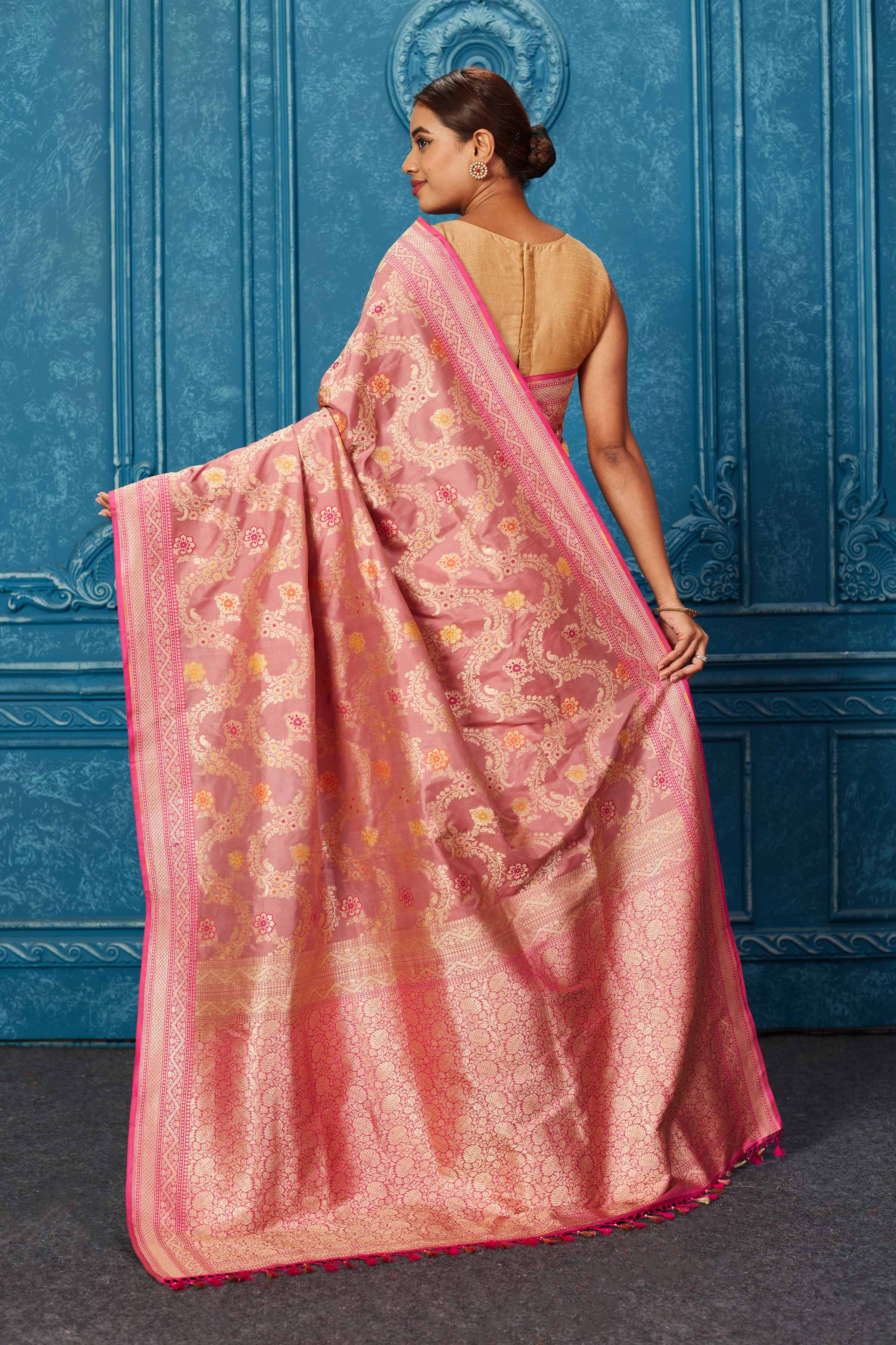 Shop blush pink Banarasi saree online in USA with zari minakari jaal. Look your best on festive occasions in latest designer sarees, pure silk saris, Kanchipuram silk sarees, handwoven sarees, tussar silk sarees, embroidered sarees from Pure Elegance Indian saree store in USA.-back